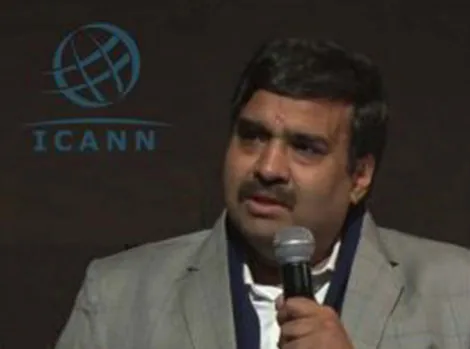 Speaking on stage at an ICANN public forum.